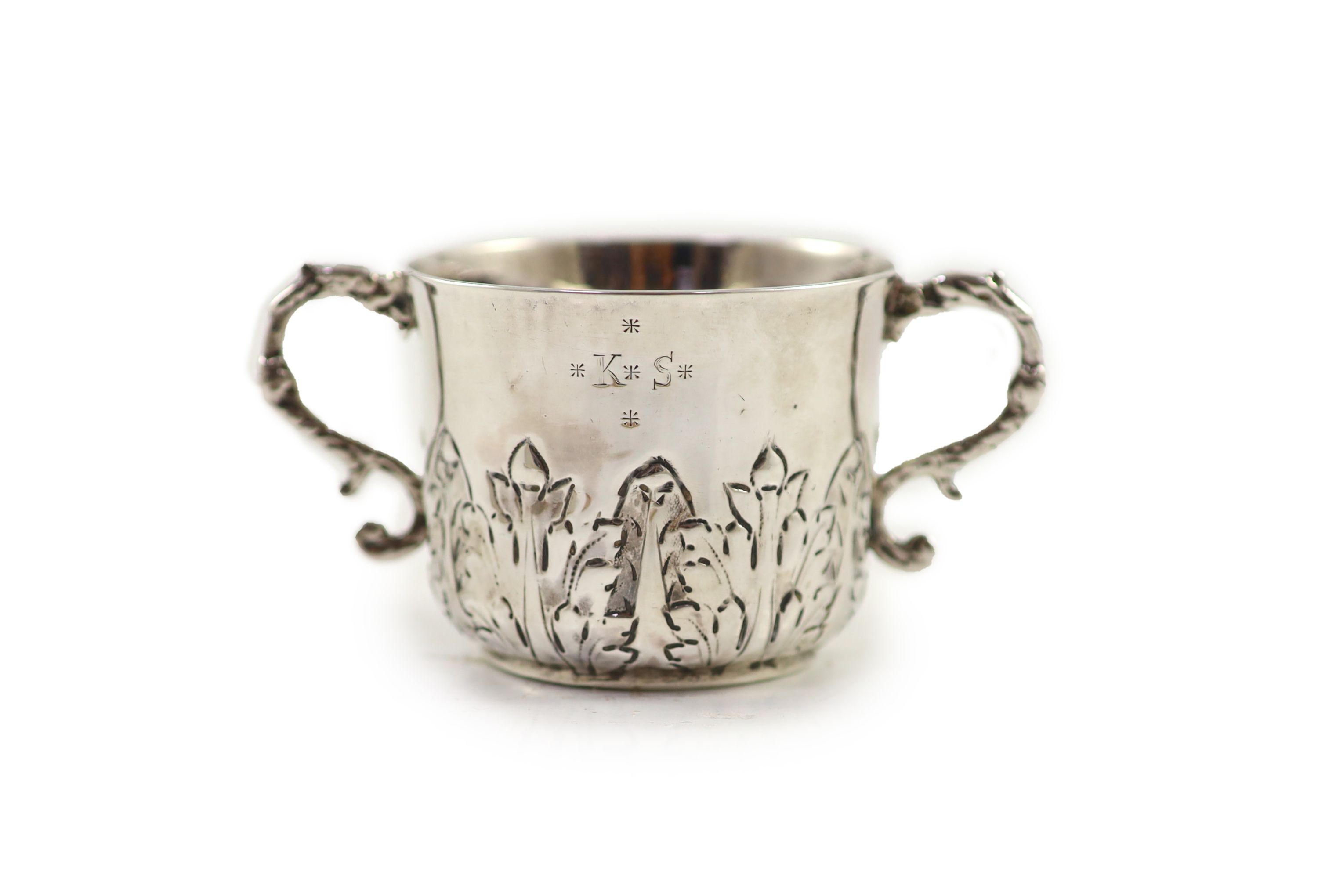 A William III repousse silver porringer, by Jonah Kirk, London c.1695